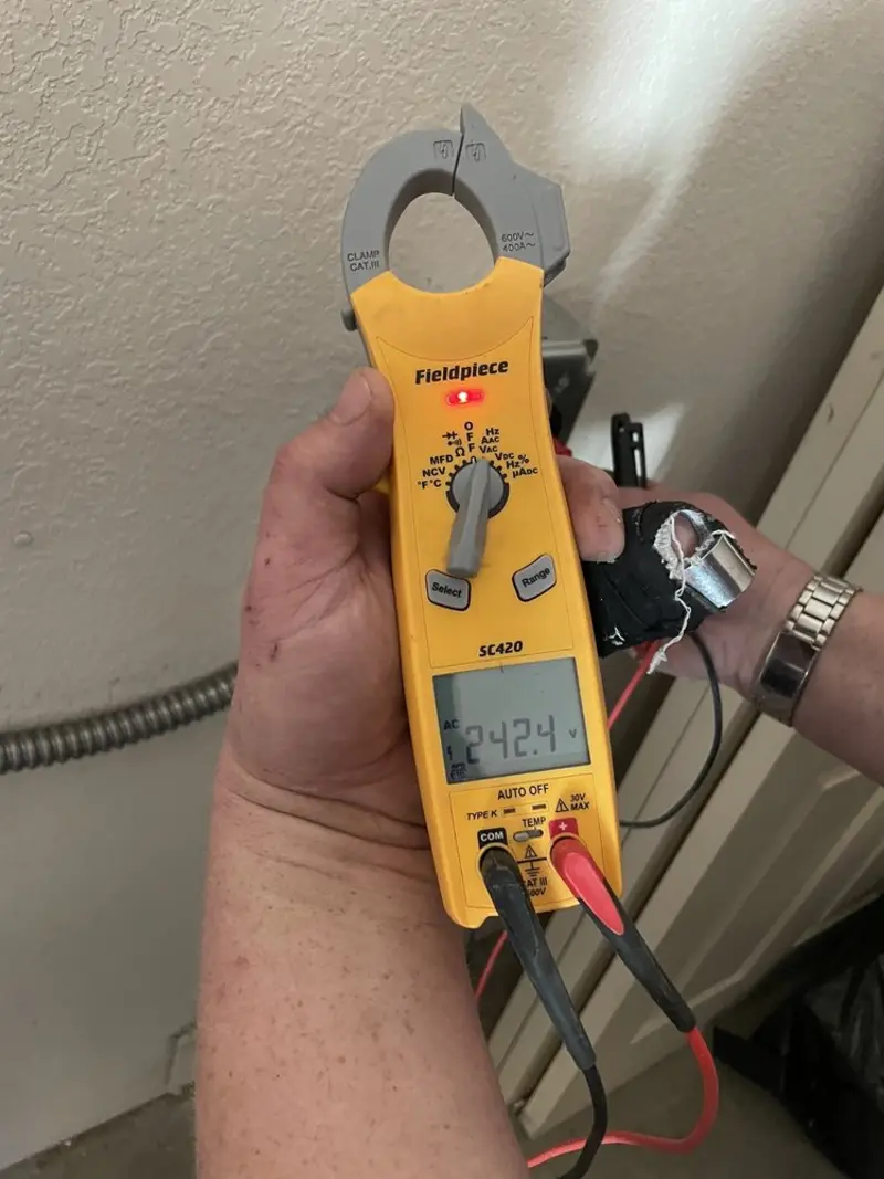 Voltage testing with clamp meter during Aluminum Wiring Replacement in Maumelle